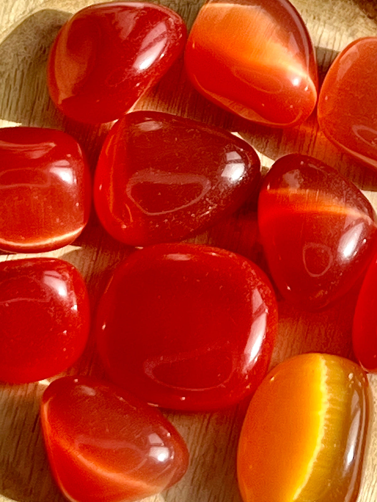 Red Cats Eye tumblestone crystal, gemstone gift for her, Cat’s Eye, wealth & protection, ethically sourced UK healing crystals, Root Chakra